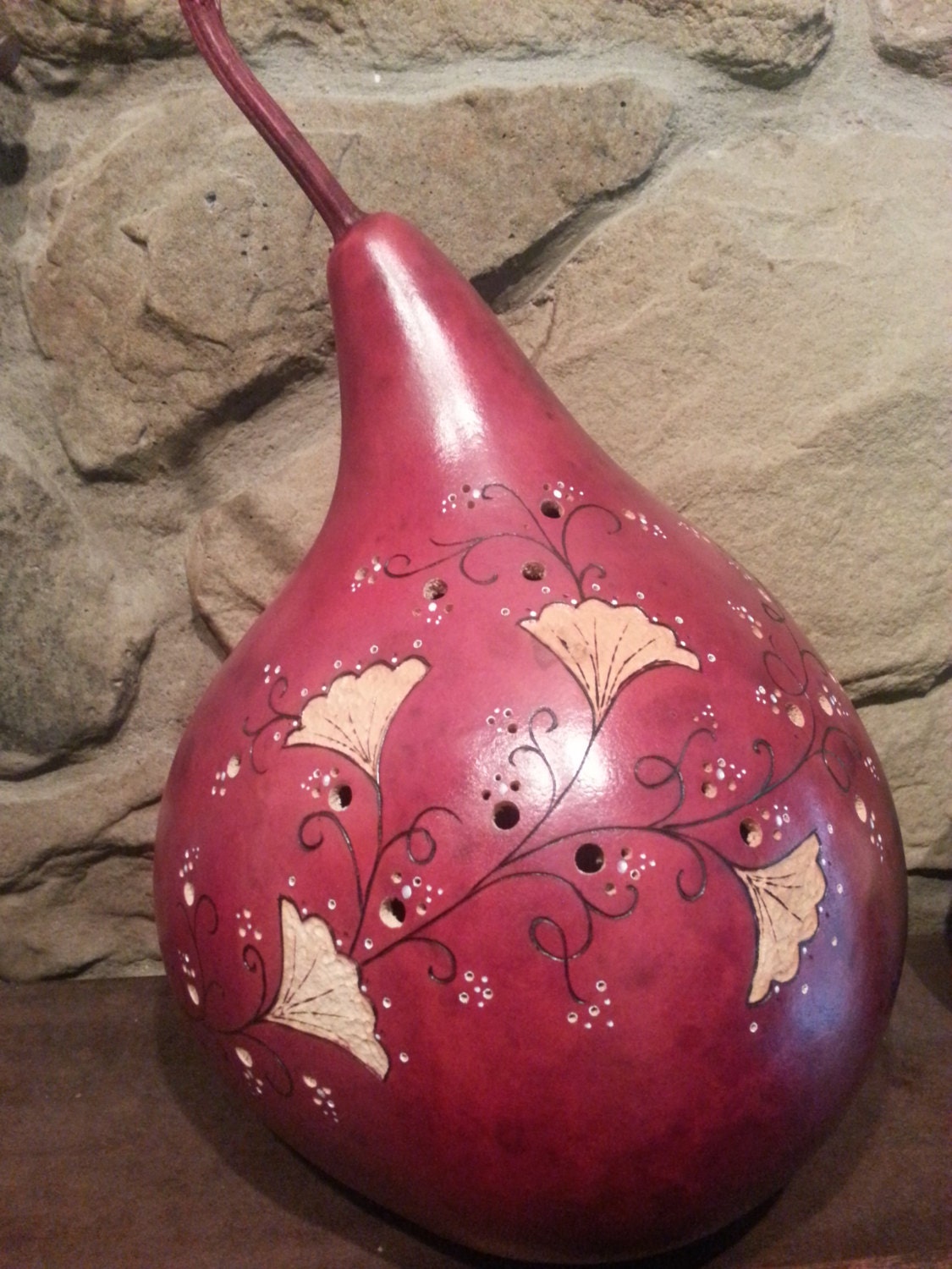 Hand carved gourd flower luminary.