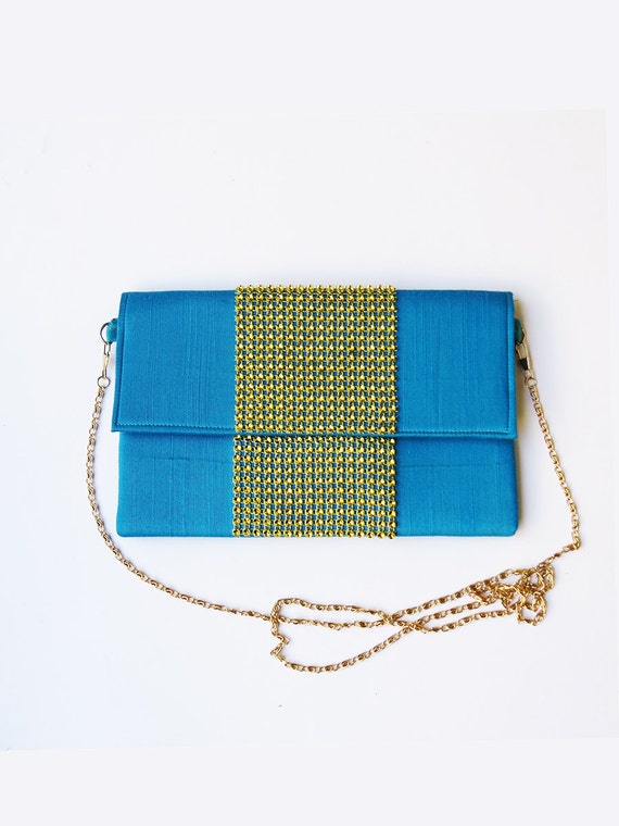 gold and blue clutch