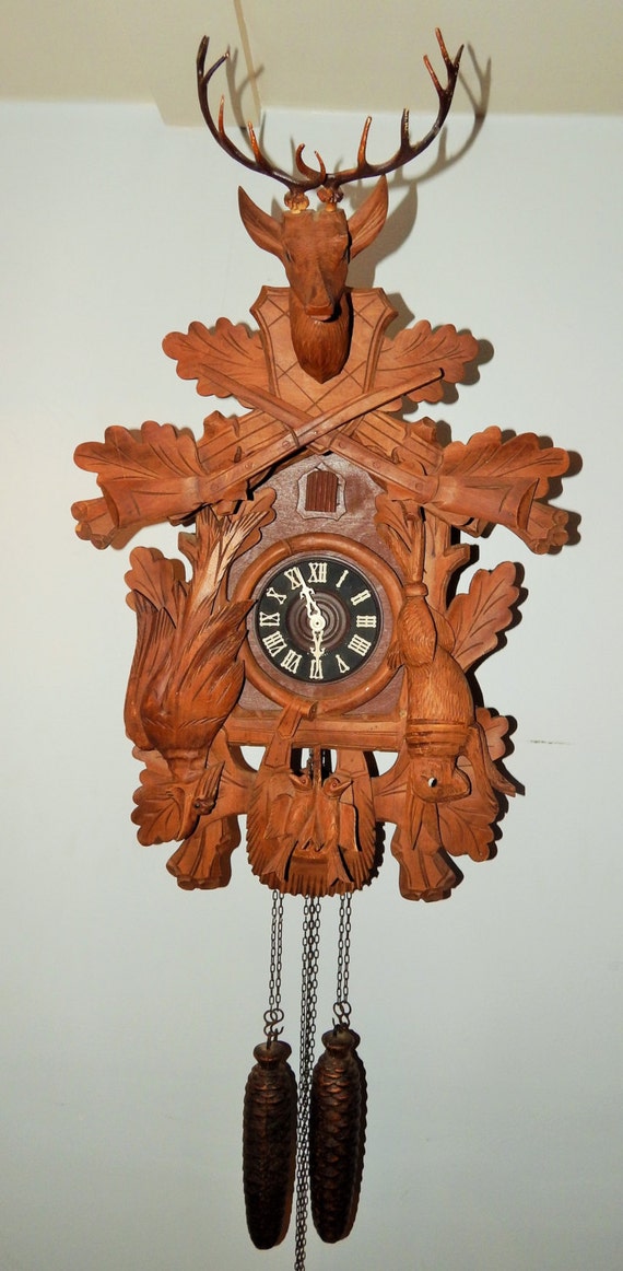 Antique German Black Forest Hunters Cuckoo Clock. This is a