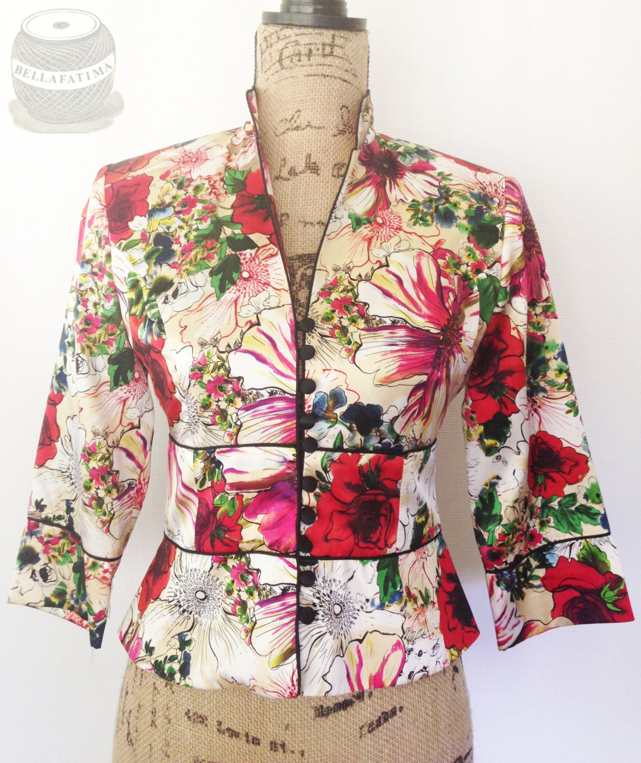 Vintage multicolor silk floral jacket with notched lapel.