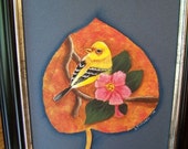 Beautiful Goldfinch on a limb