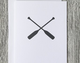 crossed oars - canoe paddle icon - outdoor nature