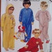 Easy McCall's P957. Size 1. Toddlers' Robe, Pajamas, Bag and Applique. Pattern is uncut and factory folded.