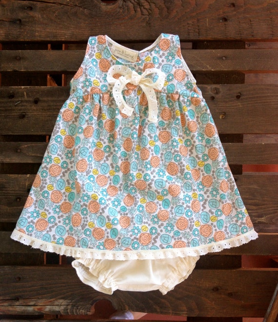 Baby girl dress in floral organic cotton. Baby dress with