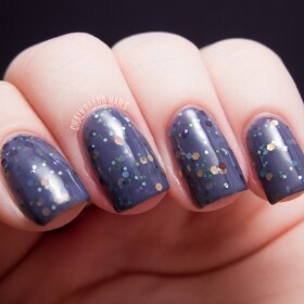Between Two Worlds Nail Polish - lilac jelly with multicolor earth tone glitter