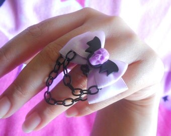 Pastel goth bat and skull ring purple