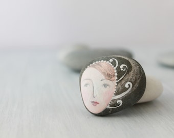 Painted stone. painted pebble. Beach pebbles art