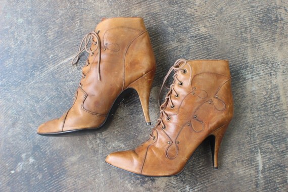 brown heeled lace up boots