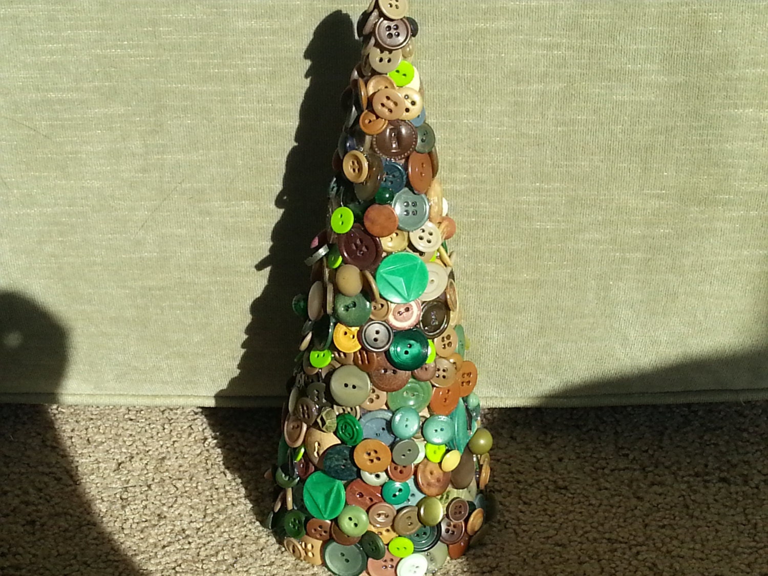 Handmade decorative multi colored brown tan and green new and vintage button Christmas tree