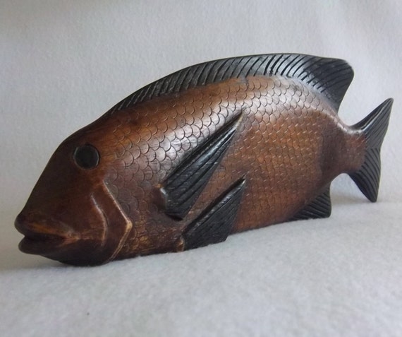 large wooden fish sculpture