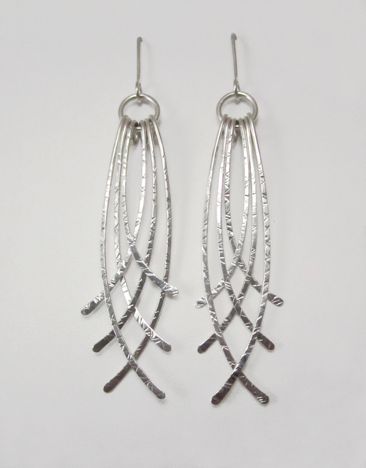 Sterling silver crossed hammered wire earrings