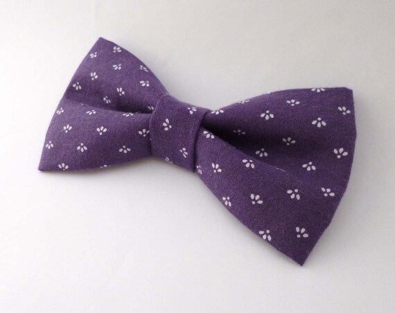 Purple and white mini abstract flower clip on bow tie in an