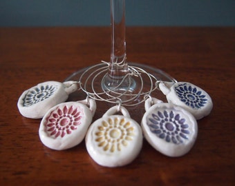 Set of five: Handmade ceramic wine charm set, flower wine charms, handmade wine charms, clay wine charms, floral wine charms