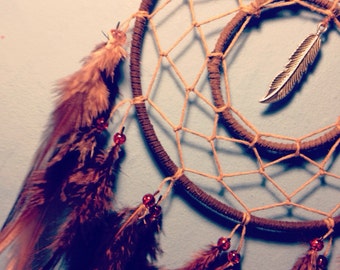 Brown dream catcher, brown web, rooster feathers, silver charm and hoop insert finish 15cm diameter dreamcatcher hand made