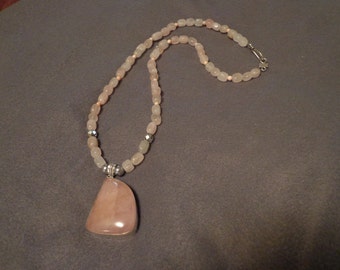 pink quartz necklace meaning