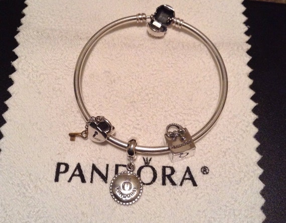 Authentic Pandora bangle bracelet with threaded charms