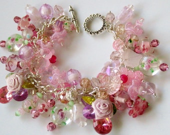 Pretty in pink loaded spring cha cha charm bracelet