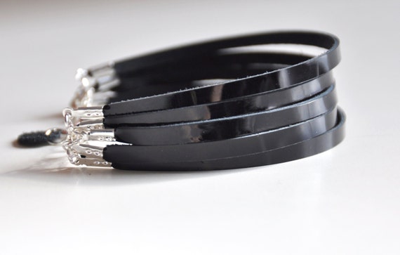 multi strand black bracelet in patent leather