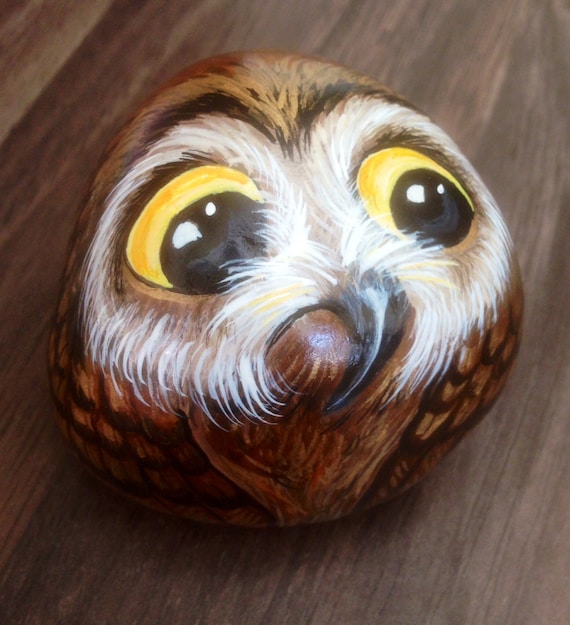 Owl hand painted rock art pet on cobble stone