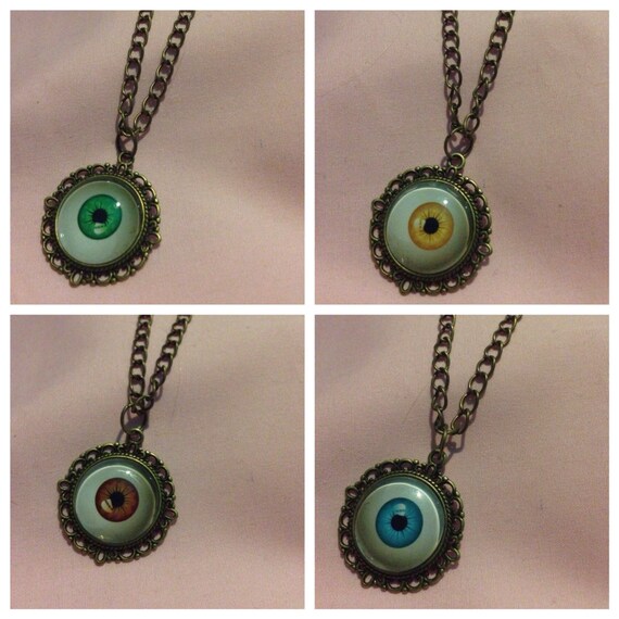 Items similar to Creepy Coloured Eye Necklace on Etsy