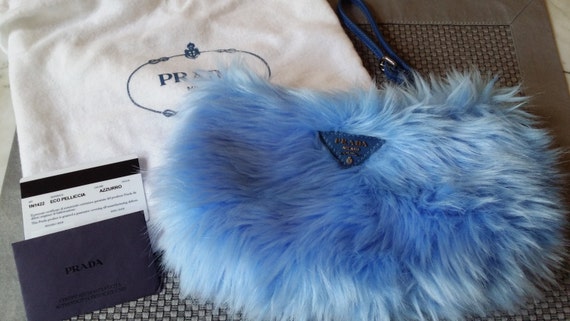 prada blue fur clutch bag  