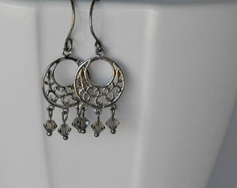 Items similar to Art Nouveau Sun & Moon Chandelier Earrings on Etsy