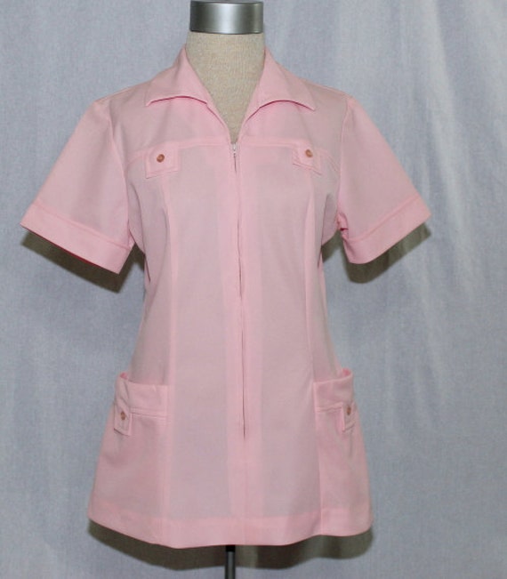 Vintage 1970s pink womens uniform shirt is A line styled with