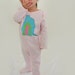 Monsters Inc inspired Organic cotton baby sleepsuit/bodysuit/footed pyjamas/onesie/playsuit. Pink or blue. Screen printed by hand.