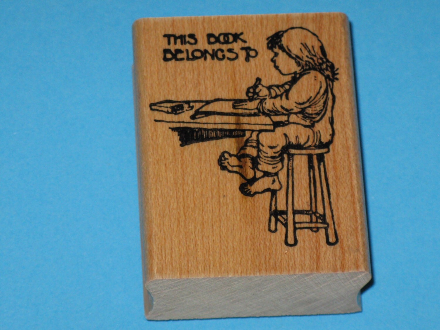 Rubber Stamp Book Plate This Book Belongs TO Child at Desk