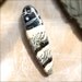 Lampwork glass bead pendant handmade by Lori Lochner "Gunmetal and ivory dagger pendulum pendant"