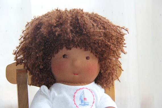 doll with curly brown hair