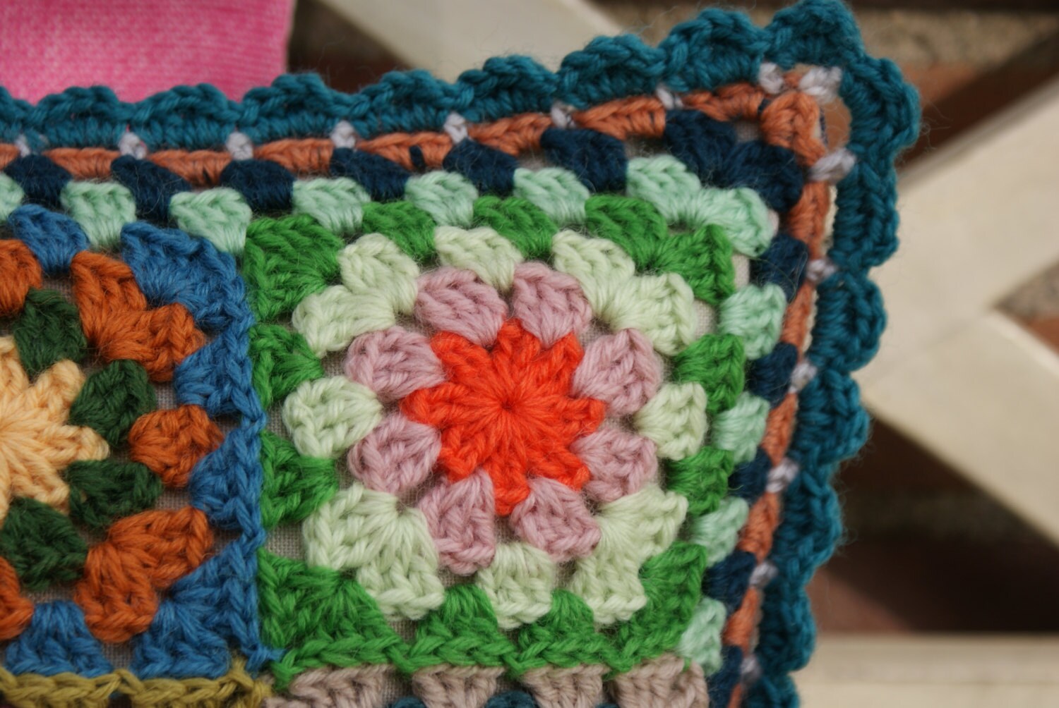 crochet 'granny square' cushion cover