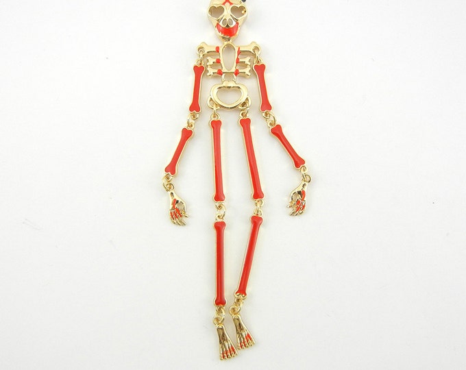 Long Gold-tone Skeleton Pendant Red Epoxy