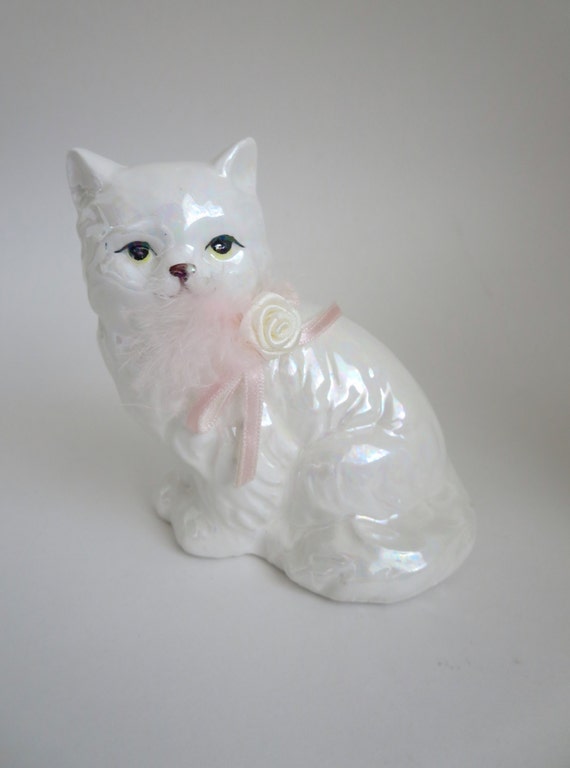 white ceramic cat figurine