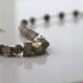 Fossilized Coral Brushed Silver Geometric Asymmetric Necklace