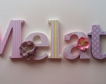 Wooden  letters for nursery in  yellow,lavender pink and green