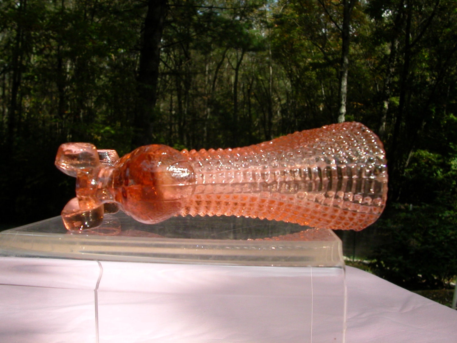 Pink Depression glass roller skate vase