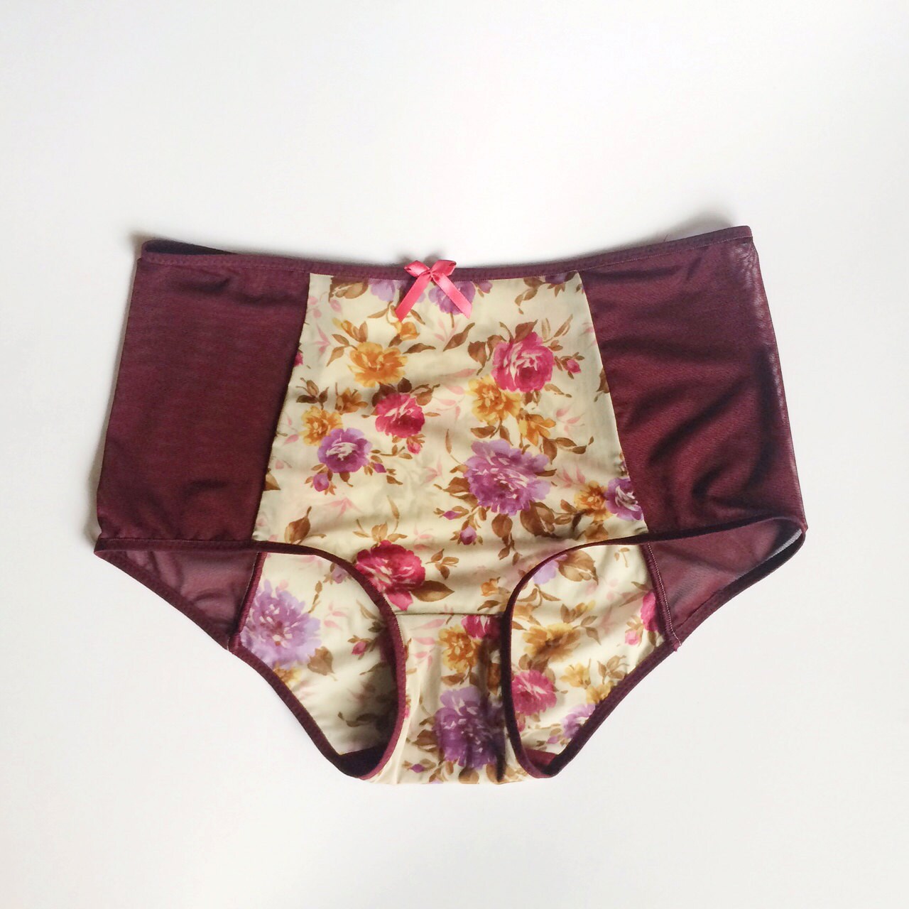 Hipster style panties. Delicate fabrics. Floral pattern and