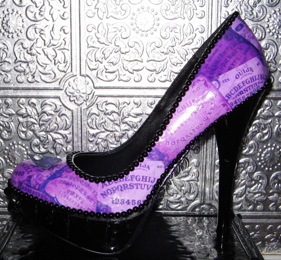 black and purple ouija board heels with glittered soles