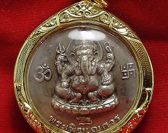 lord Ganesh ganapati vinayaka pendant amulet Ganesha hindu God of cross over obstacle with porKae hermit guru om ohm aum Hinduism deity sign