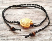 Black hemp bracelet with carved bone turtle