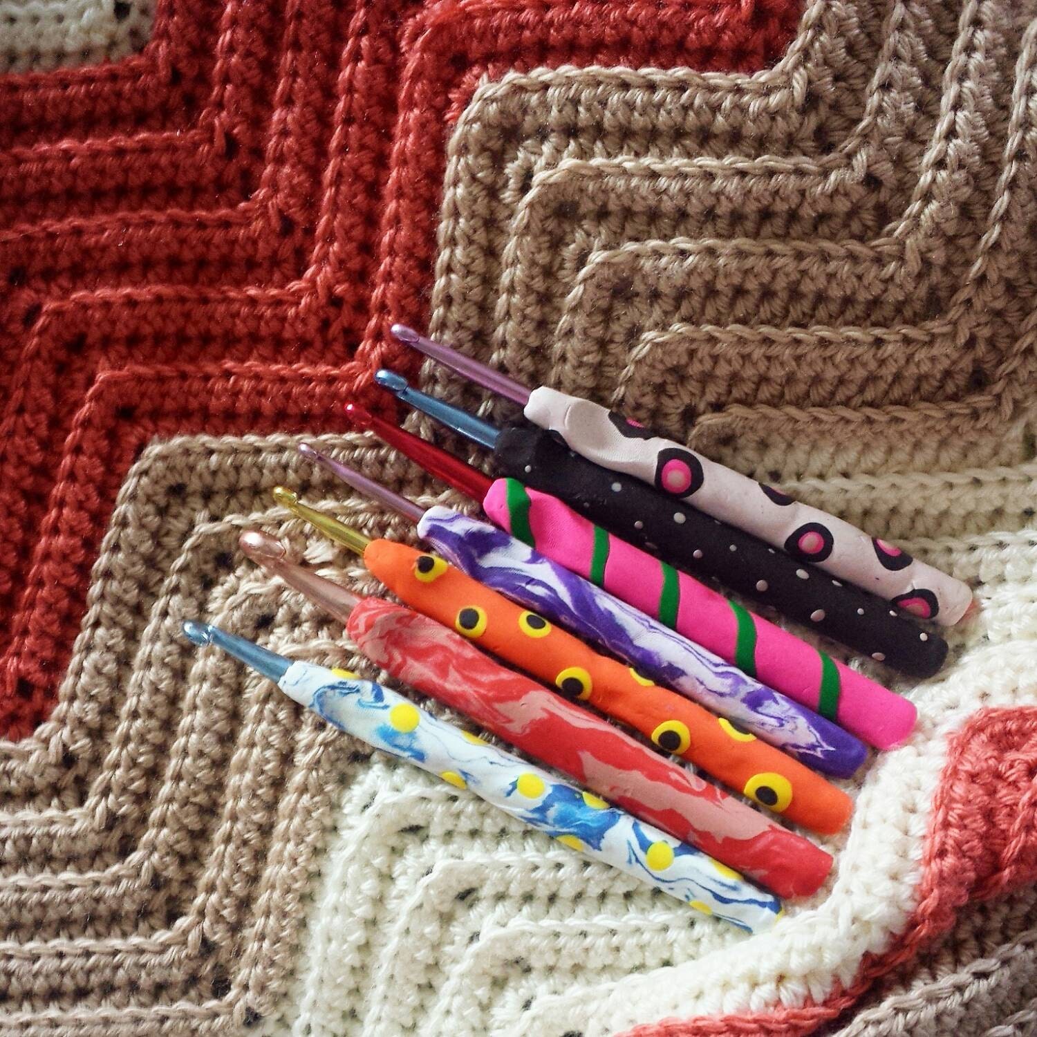Crochet hooks with handmade clay grip by Crocheala on Etsy