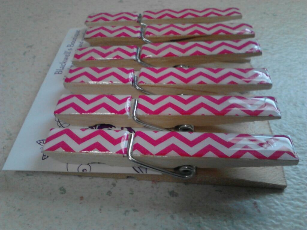 Set of 6 clothes pin clips. Pink and white chevron.