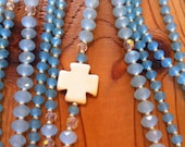 Five cross with powder blue beads