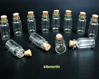 12pcs Mini Clear Glass Bottles Vials with corks. H34W16. (#2cc).