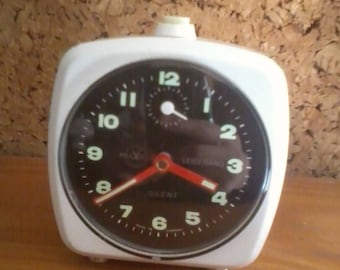 white metal alarm clock made in germany colors white
