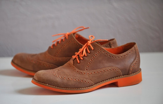 orange wingtip shoes