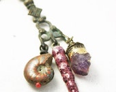 Leaping from the Pinnacle. Cosmic rustic Victorian tribal assemblage iridescent lilac pink purple necklace.