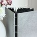 Silver and black handbound book