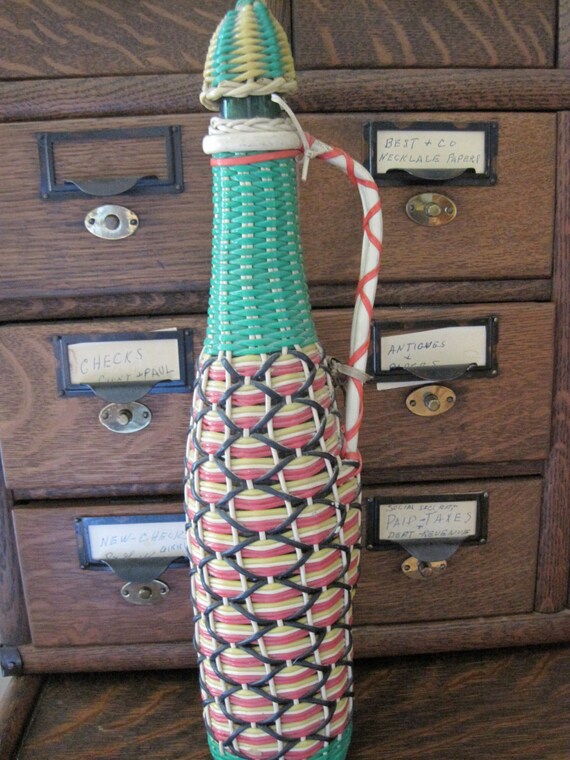 Vintage Plastc Wicker Covered Wine Bottle by NisesNostalgia